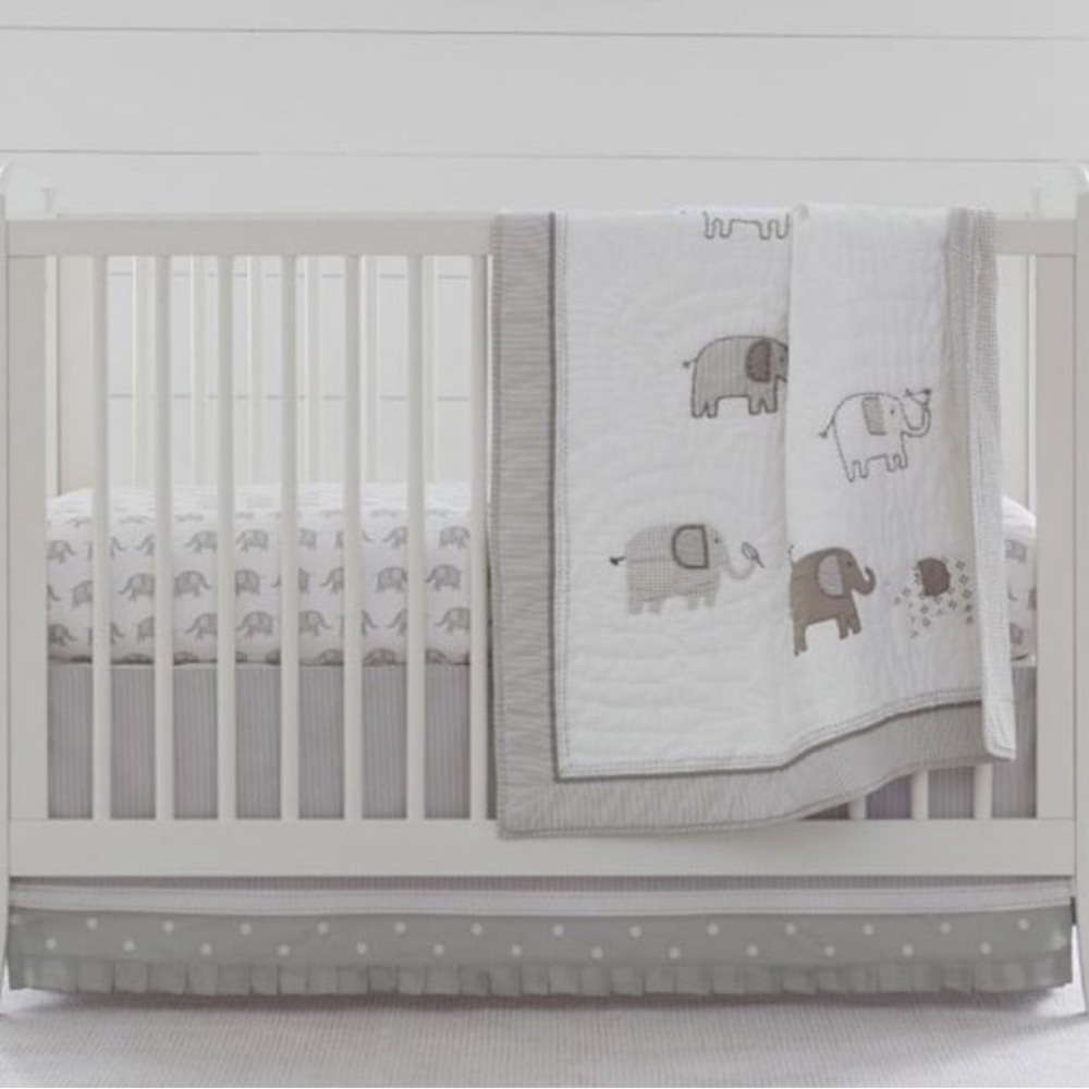 Gray and white Pottery Barn Crib Bedding. All in excellent condition